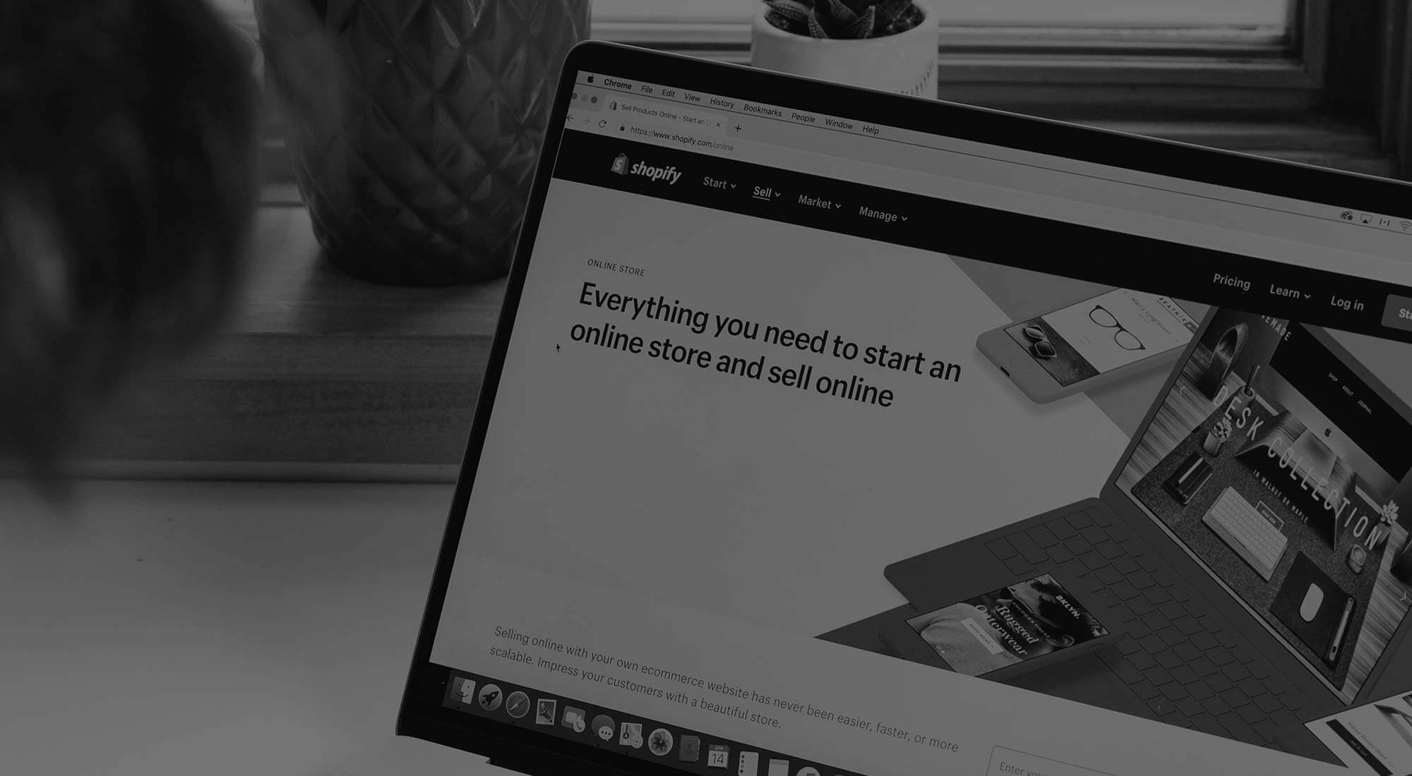 a computer screen with the shopify website on it