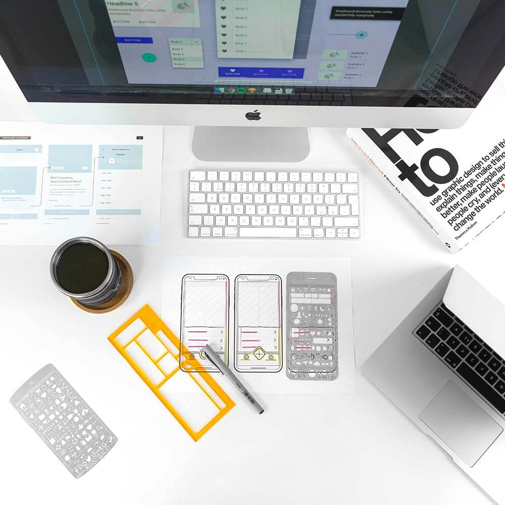 birds eye view of macbook and mobile phones