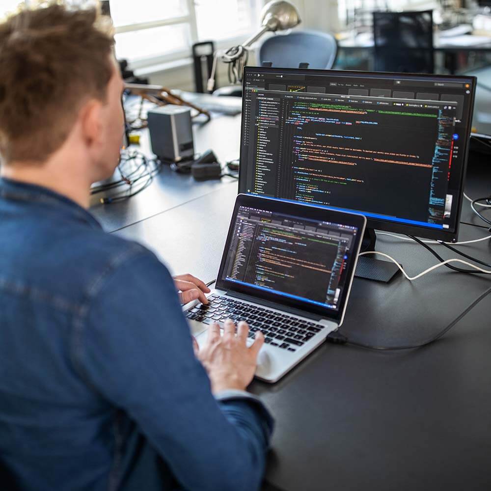 a web developer writing code