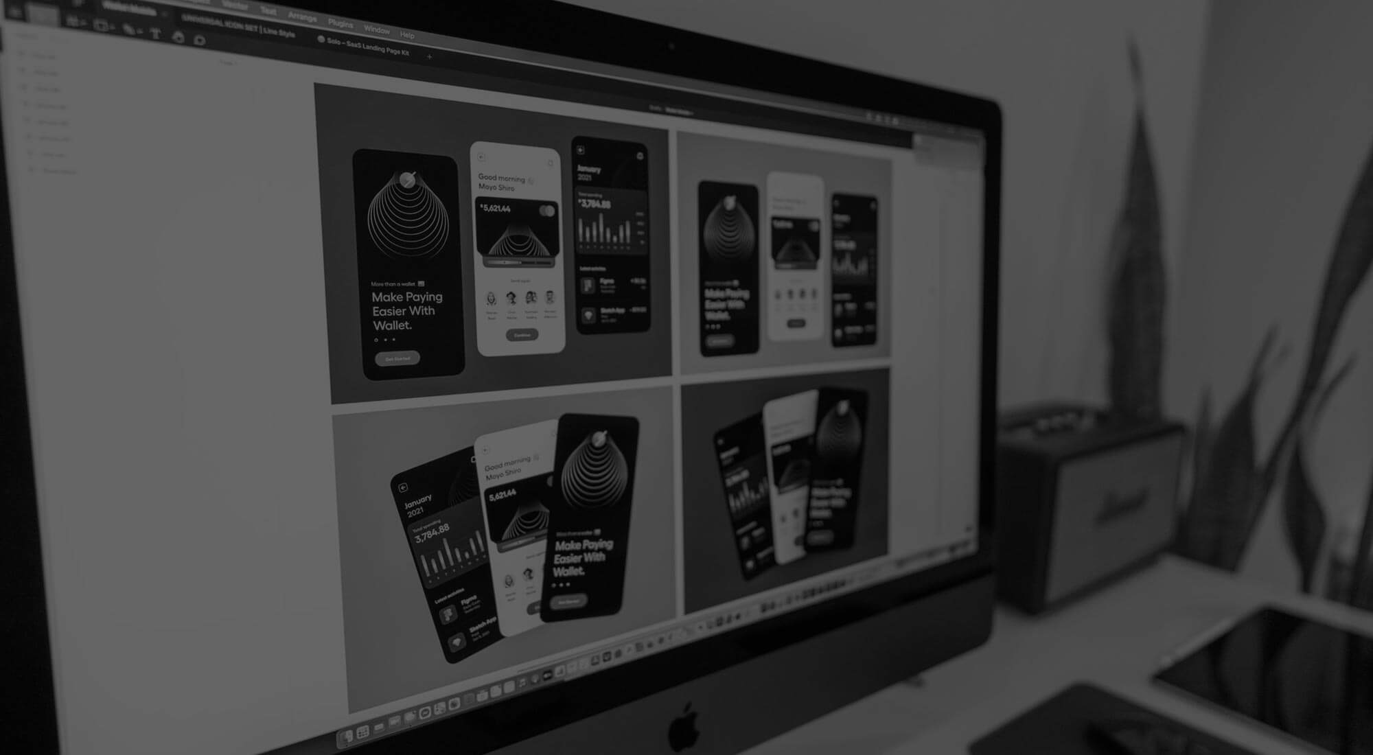 computer screen with multiple mobile mockups